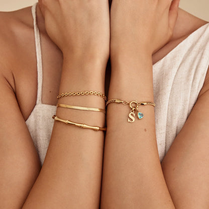 Bamboo cuff bracelet flat lay — Olivia Jewelry