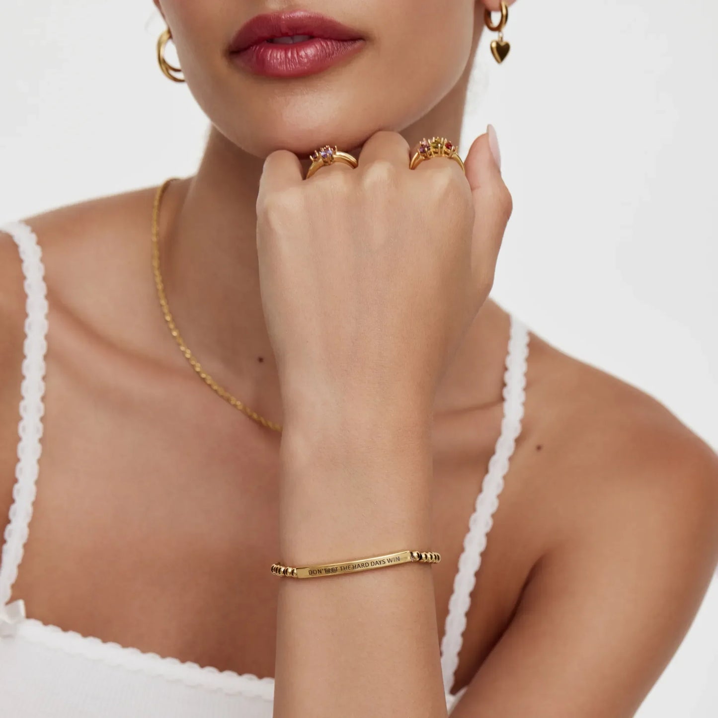 Hard Days Win bracelet flat lay gold — Olivia Jewelry